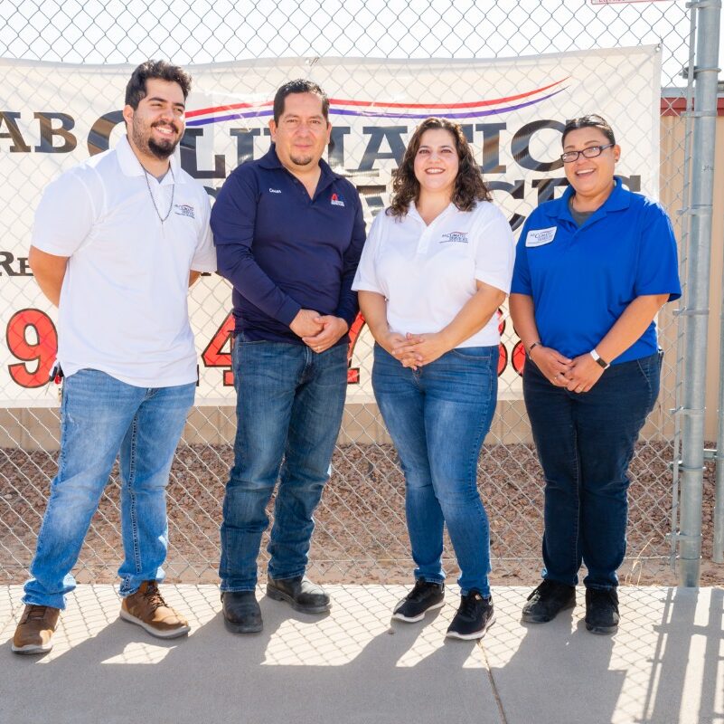 Meet our staff from AB Climatic Services in El Paso, TX standing out of our office